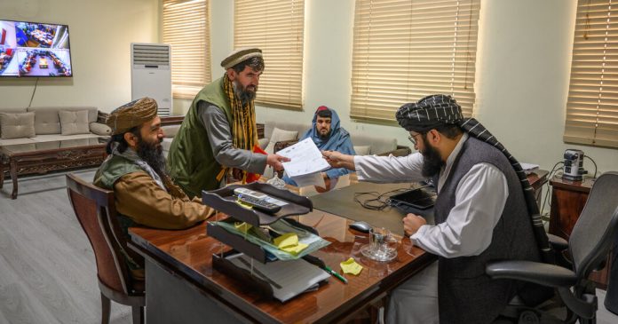 00afghanistan-taxman-1-pvlz-facebookJumbo.jpg